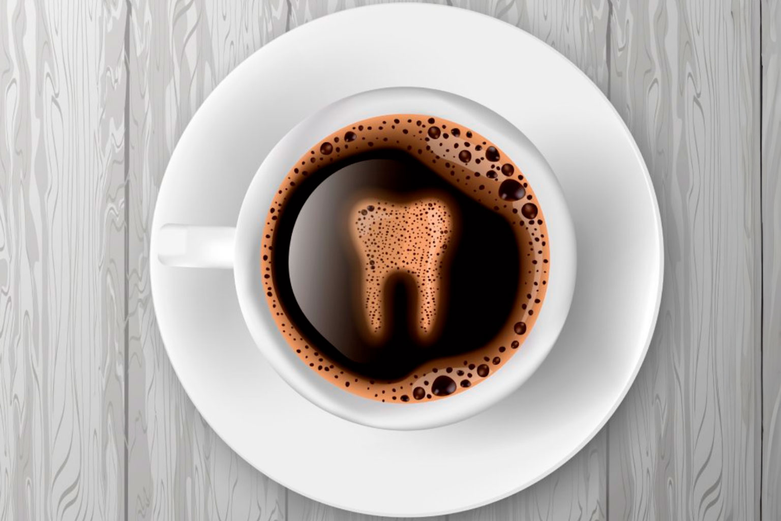 taza de cafe con diente como espuma